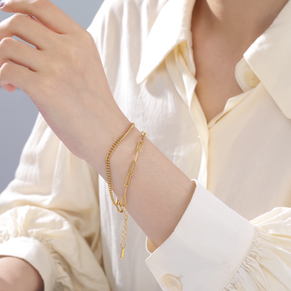 Dubbellaagse armband met kruis voor dames van titaniumstaal_voghion.com