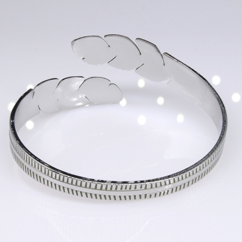 Åben armring med fjer i rustfrit stål til dame og herre_voghion.com