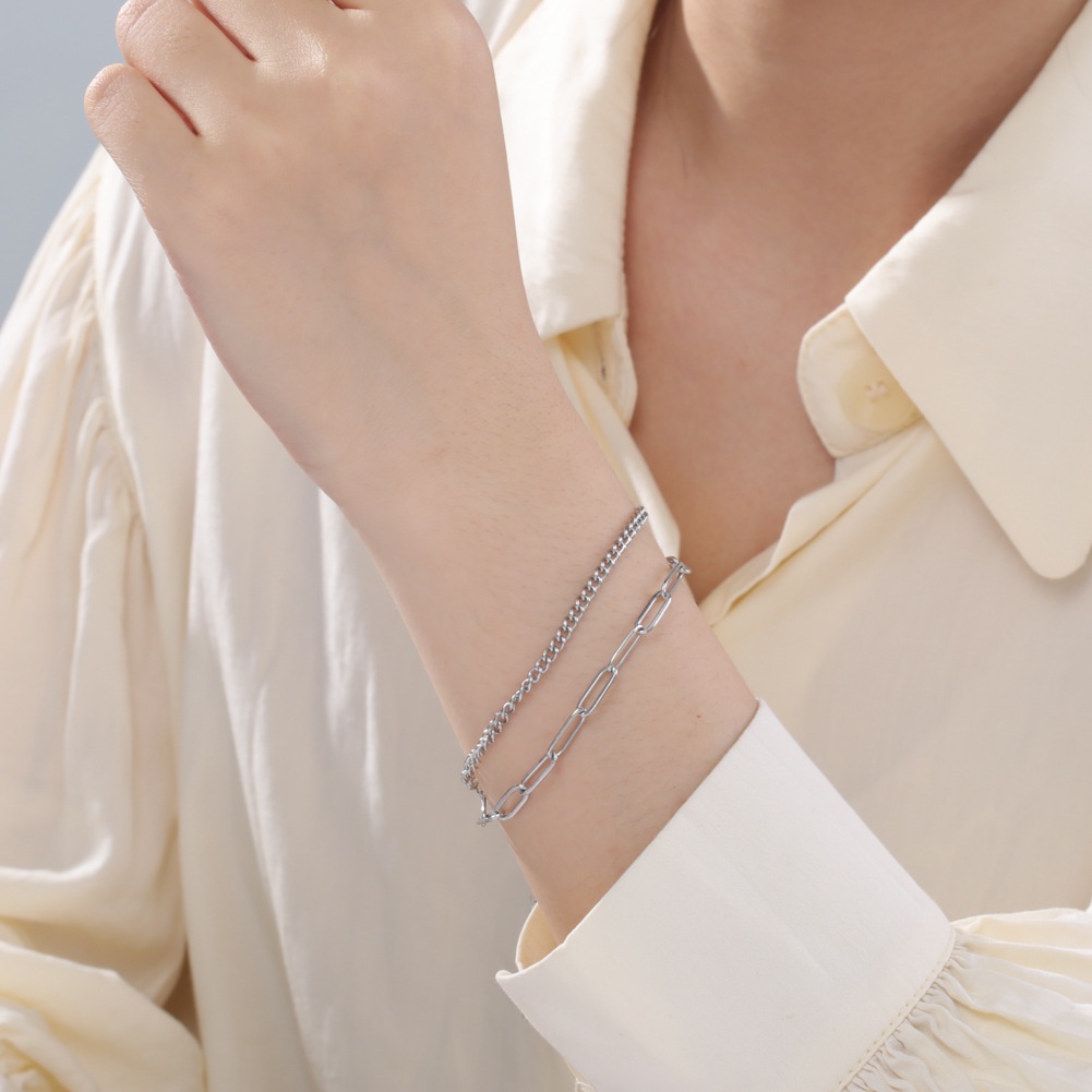 Dubbellaagse armband met kruis voor dames van titaniumstaal_voghion.com