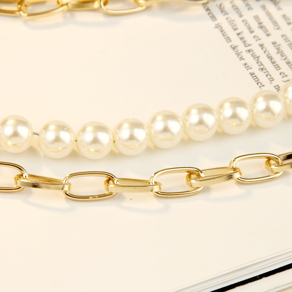 Collana multistrato con ciondolo a croce moneta e perla donna_voghion.com