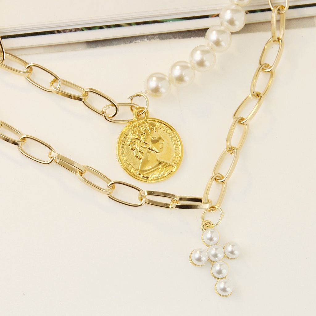 Collana multistrato con ciondolo a croce moneta e perla donna_voghion.com