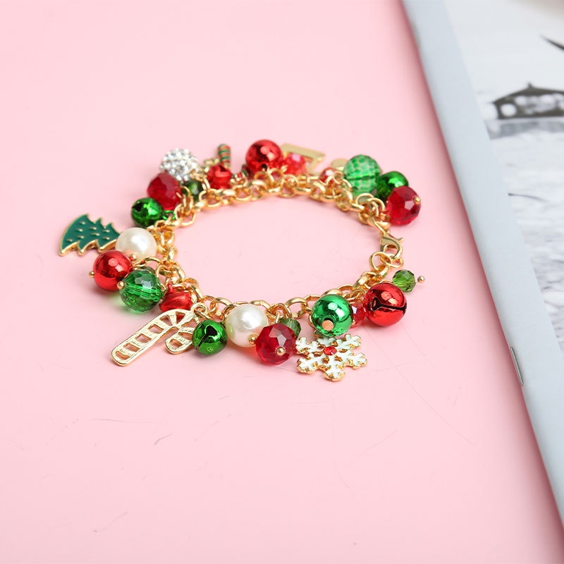 Bracelet de noël avec perles clochette et breloque flocon_voghion.com