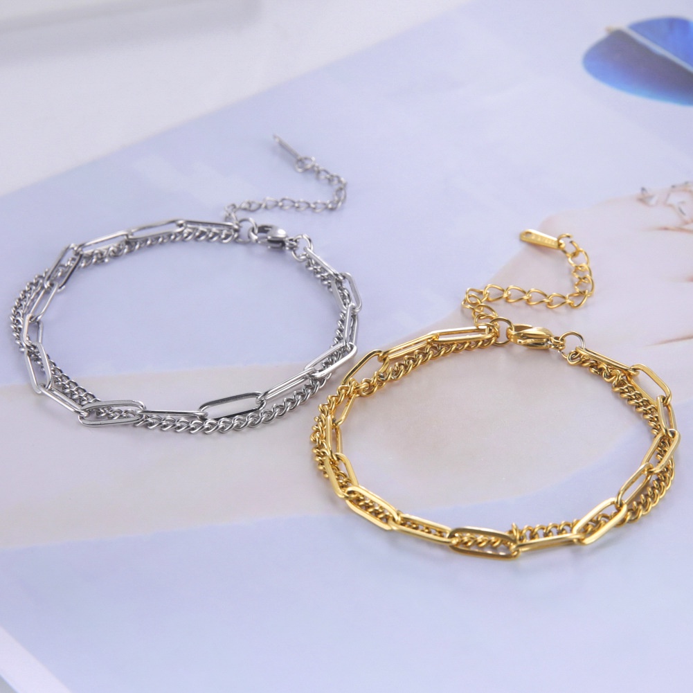 Dubbellaagse armband met kruis voor dames van titaniumstaal_voghion.com