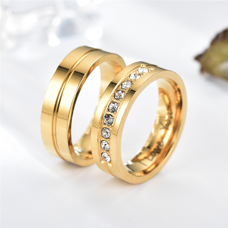 Anello di coppia con incisione e zircone in acciaio inox_voghion.com