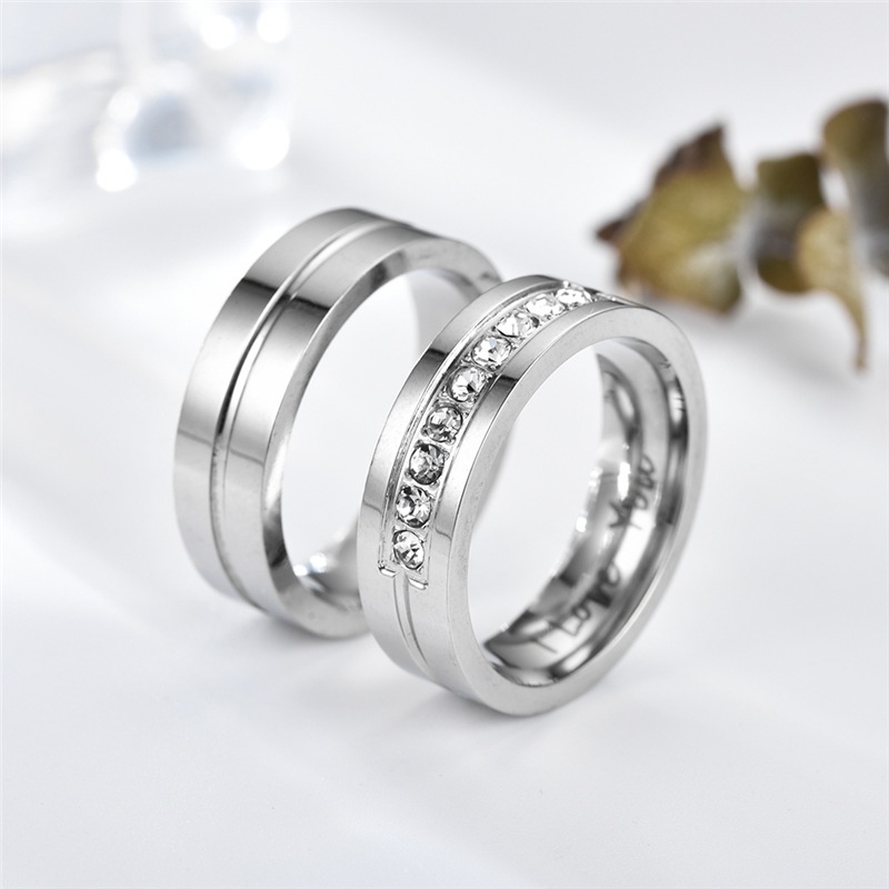 Anello di coppia con incisione e zircone in acciaio inox_voghion.com