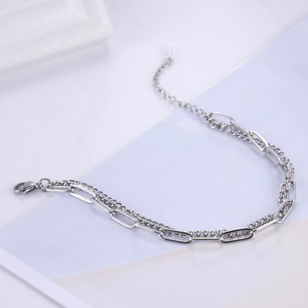 Dubbellaagse armband met kruis voor dames van titaniumstaal_voghion.com