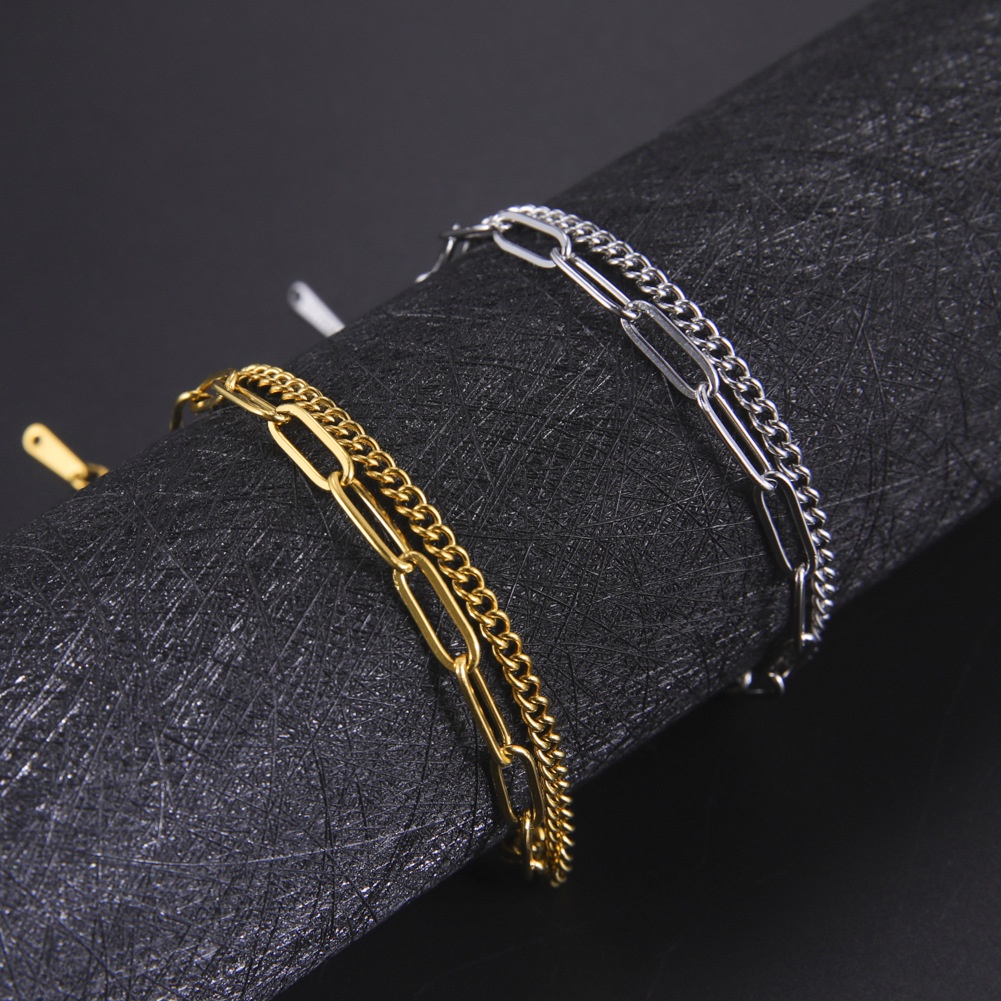 Dubbellaagse armband met kruis voor dames van titaniumstaal_voghion.com