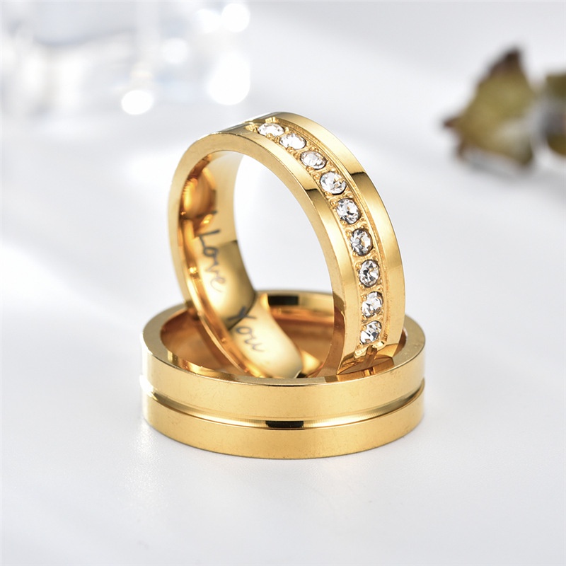 Anello di coppia con incisione e zircone in acciaio inox_voghion.com